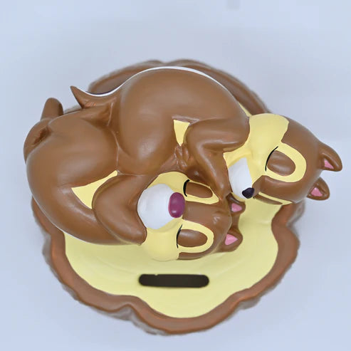 Chip and Dale sleeping Piggy Bank