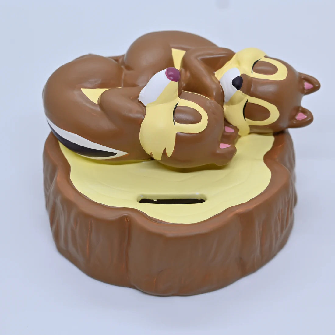 Chip and Dale sleeping Piggy Bank