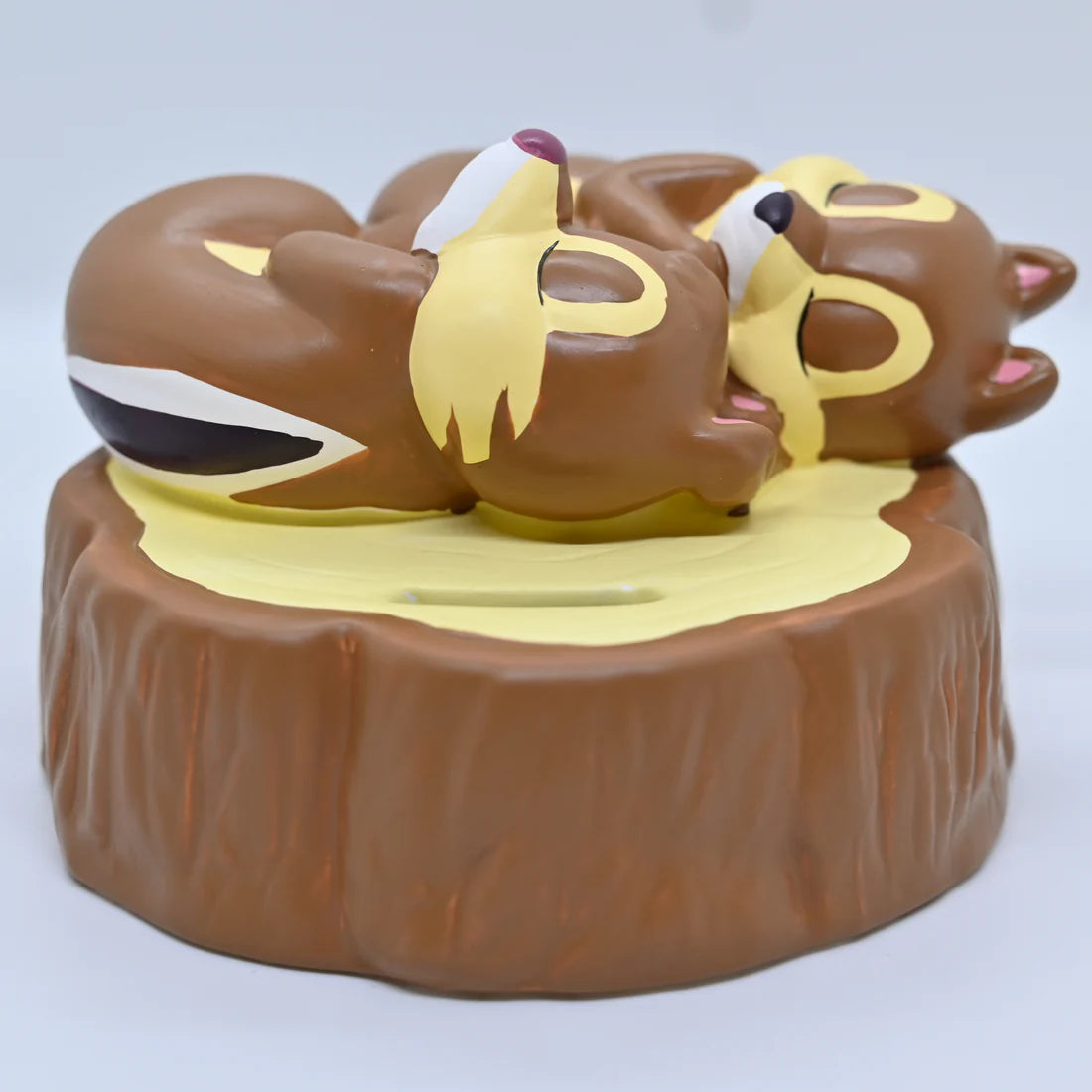 Chip and Dale sleeping Piggy Bank